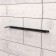 Holder for storage of adhesive tape, adhesive or painting tape, wall, black