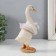 Polystone souvenir "Goose in the inflatable circle - flamingo" 10.5x7.5x16.5 cm