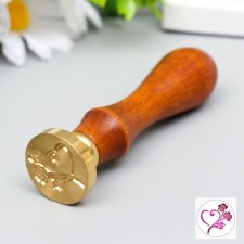 Printing for wax with a wooden handle 