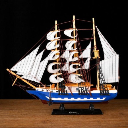 The ship souvenir medium "Spanola", the sides of white and blue, white sails, 43x39 x 9 cm