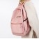 A backpack with a zipper, 3 outer pockets, pink color