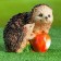 Garden figure "Hedgehogs with an apple" 12x15x14cm