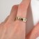 Ring "thirteen" cat, black color in gold, dimensionless