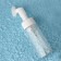A bottle with a brush for washing, with a dispenser, 150 ml, white/transparent color