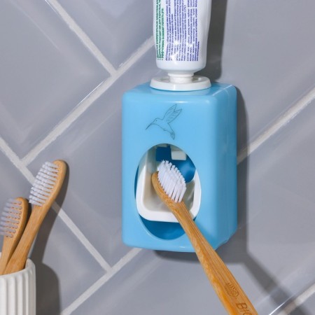 Mechanical toothpaste dispenser "Hummingbird", 9.5 x 5.8 cm.