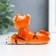 Polystone souvenir "Blue -eyed tiger with coins/bills" MIX 4x4x10 cm