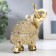 Souvenir Polystone "Golden Elephant with a blade of beads with bells" mix 11.5x11x5.5 cm