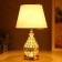 Highlight lamp with a backlight 16679/1 E27 40W RISALUX gold