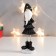 Polystone souvenir "High Santa Claus in black caftan, with a star" Long legs 15x5x4 cm