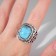 Ring "turquoise world" oval, black and blue color in black silver, dimensionless