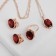 Set 3 objects: earrings, pendant, ring dimensionless “Edel” oval elongated, red color in gold, 45 cm
