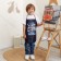 Apron Children's Ethel "Open the World", 49 x 39 cm