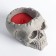 Figure Aromatic candle in concrete "Skull", 14x11 cm, red, garden berries