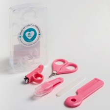 A child’s care set, 5 items (comb, tweezers, scissors, a knipser, saw), pink color