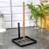 Standing for paper towels of a share, 30 × 15 × 15 cm, black color
