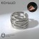The ring "links" is wide, the color is silver, dimensionless