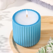 A candle in a candlelight made of gypsum with narrow faces, 7x8cm, blue