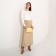 Back-clate on the valve, beige color