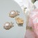 Brooch "Snail" with a pearl, white color in gold (indivisible packing 12 pcs., Price per pcs.)