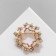 Brooch "Flowers" in a wreath, the color is white in matte gold