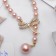 The necklace is “pearl” with a flipping element, dragonfly, pink color in gold, 50 cm