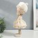 Interior doll "Baby in beret, in a beige outfit, with a flower" 36.5x13x17 cm