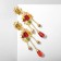 Hanging earrings "Flowering", colored in gold