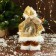Santa Claus "in a suit with sequins, with a flashlight" moves, with backlight, 28 cm, gold