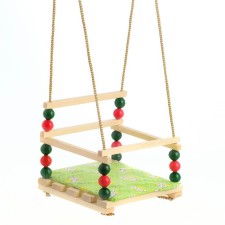 Suspended armchair for a playing site with a soft seat, 