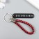 Keychain metal to the leatherette "strap with a license plate" Red-black 12.5x4 cm
