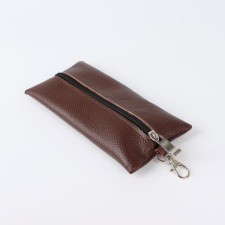 Key of zipper, length 17 cm, metal ring, color light brown