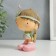 Souvenir Polystone "Baby-Indian with onions and arrows" 14x7x8.5 cm