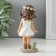 Souvenir Polystone "Baby in a white dress in a cage, with a frog" 5.5x3.5x12 cm