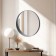 Wall mirror "black ruby", in a round building, d = 50.5 cm