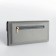 Women's wallet on the button, gray color