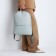 Women's backpack made of artificial leather with lightning, 2 pockets, color light blue