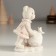 Polystone souvenir "Bear with a bird on a large snowball" 7.5x5x10.5 cm