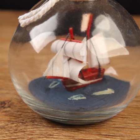 The ship souvenir "Vseslav", in a bottle, vertical. 9*7cm-1