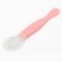 A spoon of children's silicone for feeding, pink color