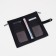Women's wallet on the button, black color