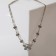 Piece on a decorative basis "butterflies" with pearls, white color in black silver, l = 45 cm