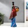 Polystone souvenir "African in a colored dress, with a fruit basket" mix 32.5x10x8 cm