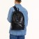 City backpack of artificial leather with lightning, 3 pockets, black color