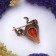 Amber Brooch cat drop, cognac color in bronze