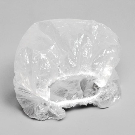 A single shower cap, in individual packaging-1