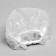 A single shower cap, in individual packaging