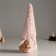 Interior doll "Granny in a fur pink cap with stars and sleds" 32 cm