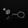 Cartage keychain, gearbox, metal, mother -of -pearl