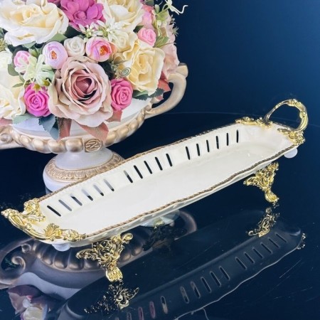 Dish with lenardi handles, on legs, porcelain, length 33 cm