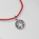 Bracelet-reinforcing "red thread" monetary, color black silver, d = 8 cm